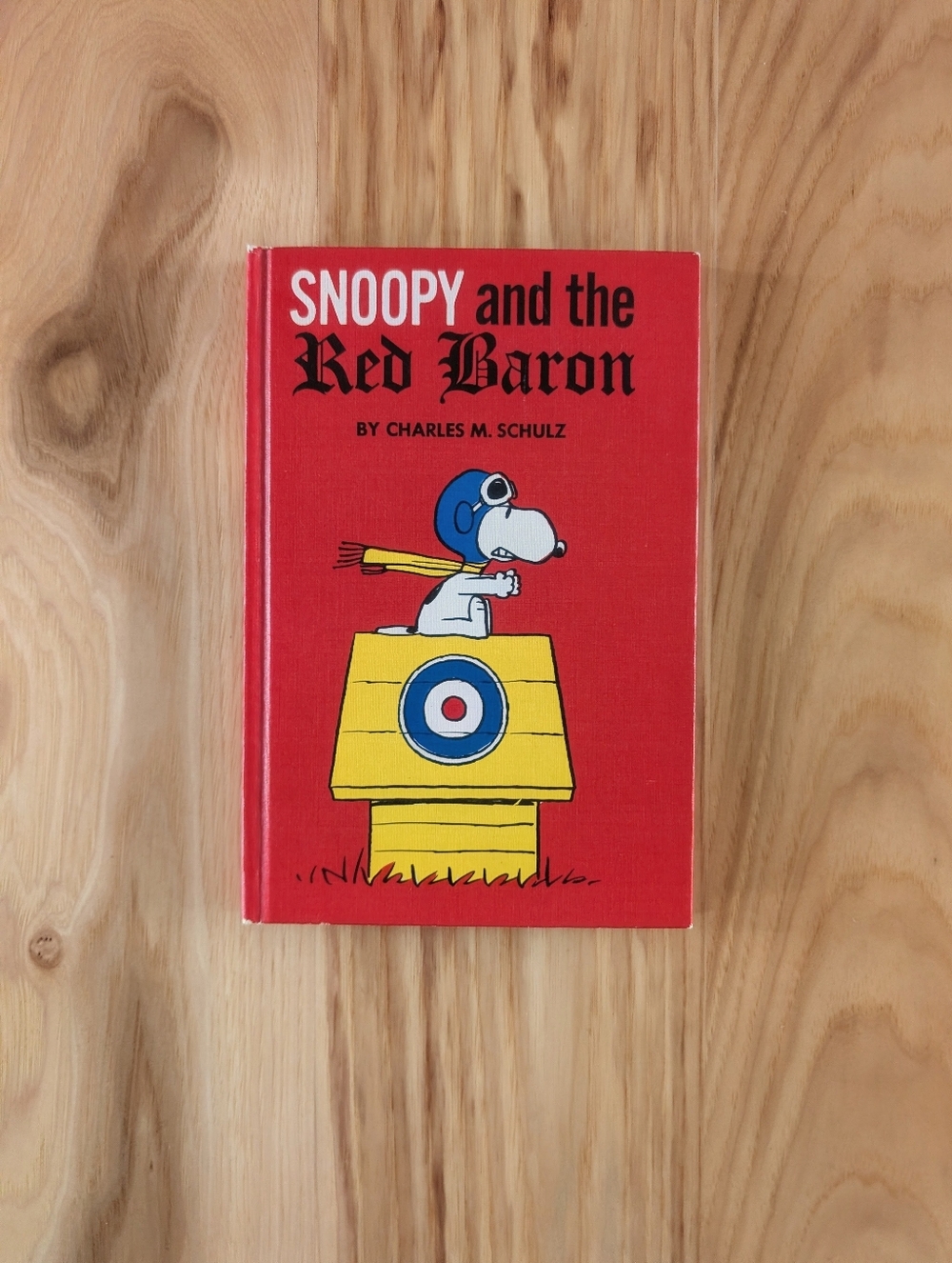Snoopy and the Red Baron Hardcover Book - Red & Yellow Cover